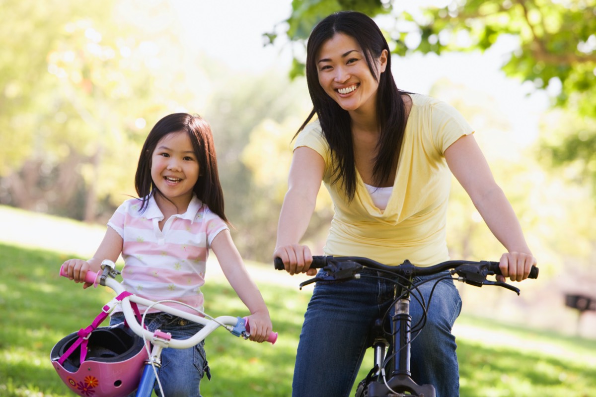 Happy Mom Daughter at Park